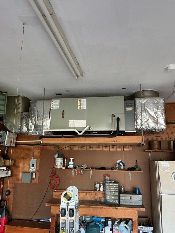 Completed comprehensive air conditioning tune-up on existing Trane system installed in December 2021. Inspected capacitor, verified electrical connections, and assessed overall system performance. Supplied and installed 20x20x4 air filter as previously arranged during last year's maintenance visit.