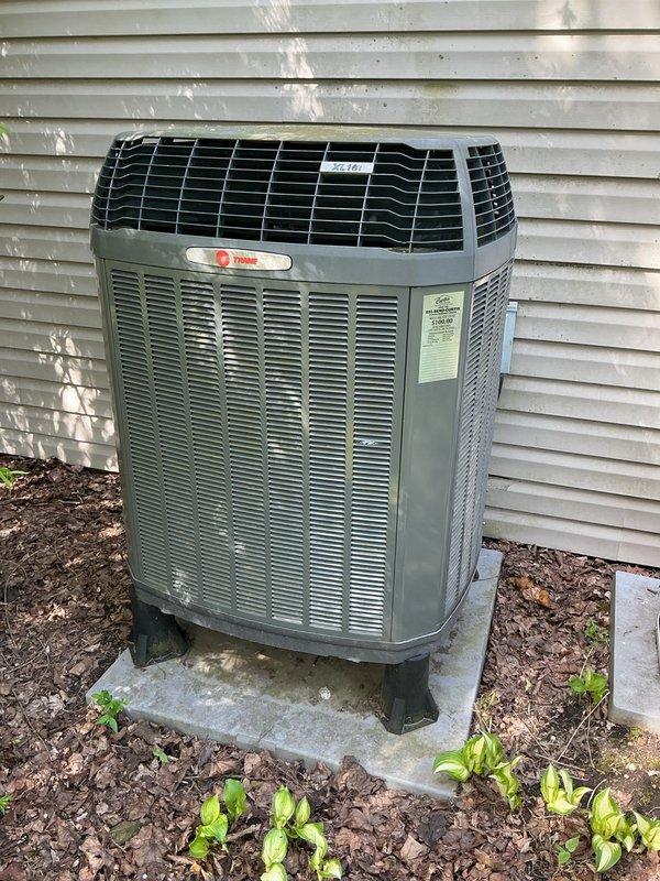 Responded to no-cooling complaint on 8-year-old Trane heat pump system. Upon arrival, confirmed outdoor fan motor operation but no cooling output. Inspected outdoor condenser unit and attic ductwork system. Diagnosed refrigerant issue affecting cooling capacity. System restored to proper cooling operation and tested for adequate airflow through duct system.