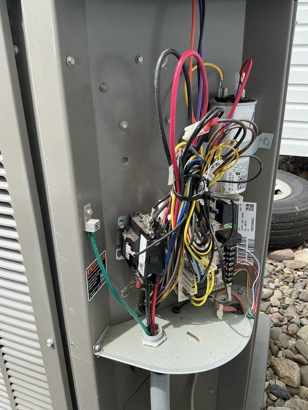 Responded to no cooling complaint on heat pump system. Upon arrival, tested capacitor which failed meter test and required replacement. Additionally addressed heating season issue where indoor blower fan would not cycle off when thermostat was set to auto mode. Installed new capacitor and verified proper system operation in both heating and cooling modes. Confirmed thermostat fan control functioning correctly with blower cycling appropriately on auto setting.