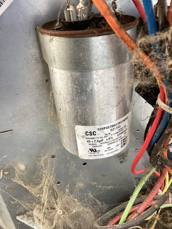 Responded to no cooling complaint with minimal airflow from vents. Accessed air handler after homeowner cleared closet and removed access panel. Diagnosed and replaced failed dual-run capacitor (45/7.5 μF, 370V) on approximately 4-year-old system. Verified proper airflow and temperature differential at supply registers upon completion. System restored to normal cooling operation.