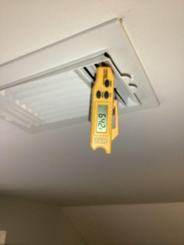 Responded to no cooling complaint with minimal airflow from vents. Accessed air handler after homeowner cleared closet and removed access panel. Diagnosed and replaced failed dual-run capacitor (45/7.5 μF, 370V) on approximately 4-year-old system. Verified proper airflow and temperature differential at supply registers upon completion. System restored to normal cooling operation.