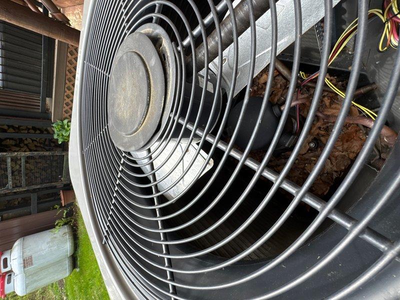 Completed comprehensive air conditioning tune-up and maintenance inspection on residential HVAC system, approximately 7 years old and previously installed by third-party contractor. Performed thorough evaluation of outdoor condenser unit including fan assembly, electrical connections, and overall system operation. Inspected indoor air handler components, verified proper electrical wiring connections, and assessed control systems. Provided estimate for replacement of leaking oil filter canister identified during inspection.