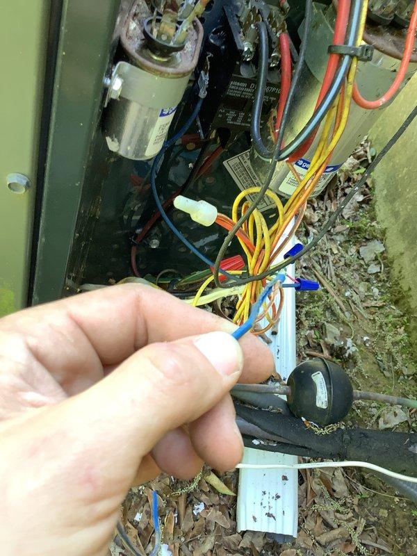 Responded to no-cooling complaint with indoor temperature at 80 degrees despite thermostat set to 76 degrees. Upon inspection of outdoor condensing unit, found excessive leaf debris and organic matter accumulated inside electrical compartment, obstructing airflow and creating potential electrical hazards. Cleaned debris from unit housing, inspected electrical connections including contactor and capacitor, verified all wire connections were secure with proper wire caps in place, and restored unit to normal operation with adequate cooling at supply vents.