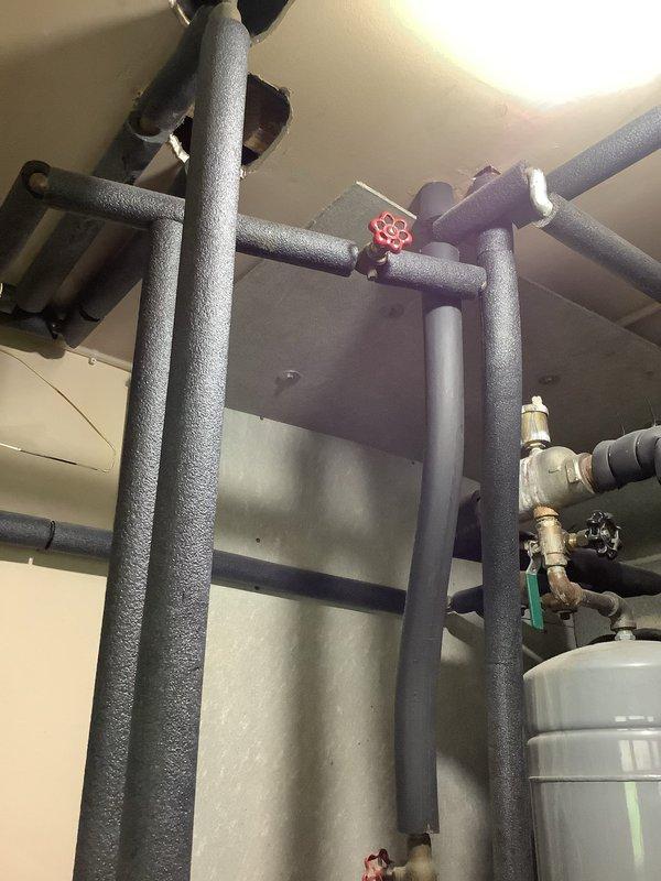 Responded to no hot water complaint on oil-fired boiler system. Upon arrival, inspected boiler unit and associated hydronic piping system. Found low system water pressure affecting boiler operation. Checked expansion tank, circulator, and zone valves for proper function. Addressed water pressure issue by adding water to system and purging air from lines. Verified boiler firing sequence, burner operation, and flame characteristics. Confirmed domestic hot water production restored and system operating within normal parameters. Advised customer regarding low water pressure throughout house plumbing system requiring attention to house water filter.