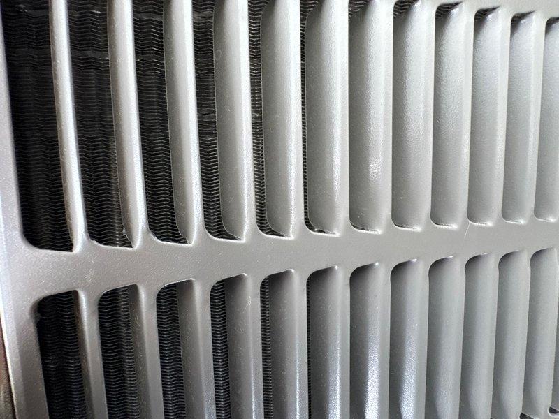Completed motor replacement under warranty on heat pump outdoor unit. Installed new MPG filter pack and performed comprehensive air conditioning inspection including examination of condenser coils, which were found to be in clean condition with proper airflow. All components tested and verified operational upon completion.