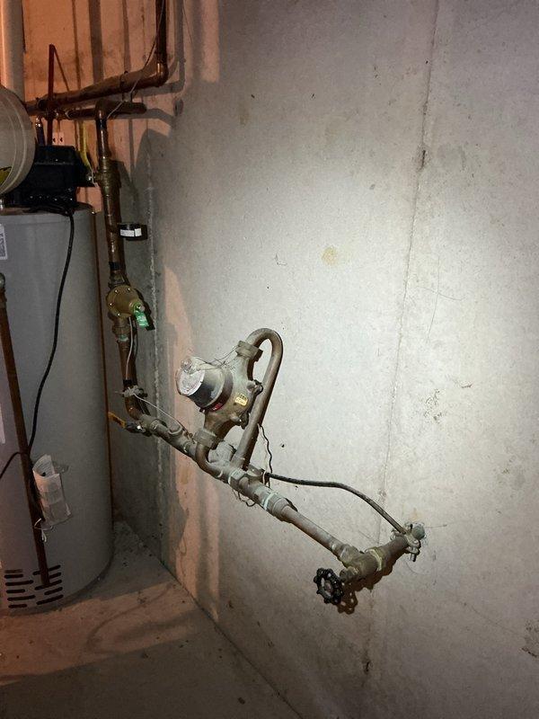 Completed Comfort Partner Membership AC inspection on existing Heil system approximately 15 years old. Installed large Honeywell filter and performed standard maintenance evaluation of equipment. Documented electrical panel and utility room conditions during inspection.