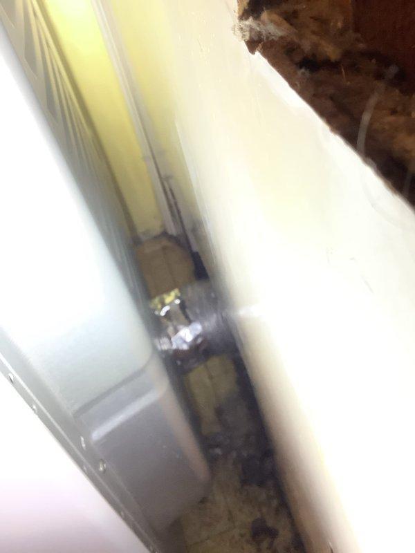 Performed dryer vent cleaning service on bi-level home with laundry located on lower level. Upon arrival, discovered previous installer had failed to connect dryer exhaust hose to vent outlet. Properly connected dryer vent hose to ensure safe operation and completed thorough cleaning of vent system from appliance to exterior termination point.