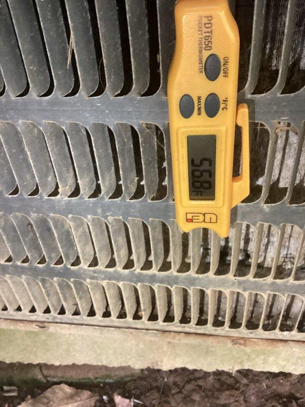Completed preventative maintenance inspection on existing Goodman air conditioning system. Performed comprehensive system evaluation including temperature differential measurements across evaporator coil, recording 53.8°F reading at unit. Conducted electrical diagnostics using clamp meter, measuring capacitance at 487 MFD to verify compressor capacitor performance within manufacturer specifications. Inspected condenser coil condition, noting dust accumulation on fins. All electrical connections verified secure, system operating within normal parameters.