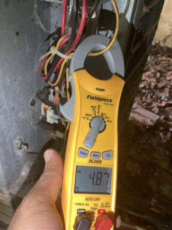 Completed preventative maintenance inspection on existing Goodman air conditioning system. Performed comprehensive system evaluation including temperature differential measurements across evaporator coil, recording 53.8°F reading at unit. Conducted electrical diagnostics using clamp meter, measuring capacitance at 487 MFD to verify compressor capacitor performance within manufacturer specifications. Inspected condenser coil condition, noting dust accumulation on fins. All electrical connections verified secure, system operating within normal parameters.