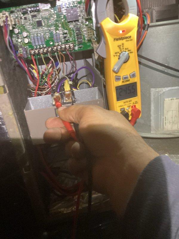 Completed comprehensive CPM A/C inspection including system diagnostics and electrical testing using digital multimeter on control board and circuit components. Inspected attic installation, structural components, and verified all electrical connections and system operations were functioning properly.