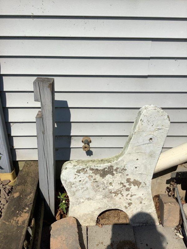 Responded to call regarding leaking outdoor hydrant at front of property. Upon arrival, confirmed hydrant had been shut off by customer to prevent further water loss. Inspected exterior hose bib and surrounding mounting area, noting weathered concrete block installation and aged hardware components. Assessed condition of hydrant assembly, mounting brackets, and connection points for source of leak. Documented existing conditions showing significant weathering and deterioration of mounting structure and hardware. Secured hydrant assembly and verified water supply remained in off position to prevent additional leakage until permanent repairs could be scheduled.