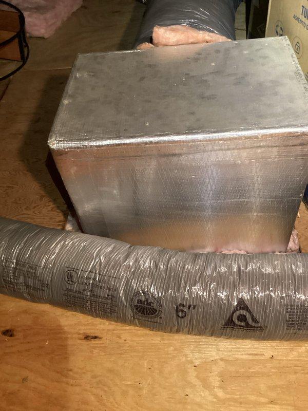 Responded to no cooling complaint on heat pump system. Found indoor evaporator coil completely iced over while both indoor and outdoor units were running. Instructed customer to turn system off and run fan only mode to allow coil to thaw completely. Inspected attic installation and ductwork system during visit. Customer reported recent filter change but uncertain of unit age and previous service history. System requires follow-up after thaw cycle to diagnose root cause of icing condition, which may include low refrigerant charge, restricted airflow, or failed components.