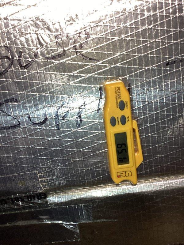 Responded to no cooling call with both thermostats displaying blank screens and solid red indicator light at attic unit. Upon inspection, diagnosed failed condensate drain safety switch due to clogged drain line on existing Trane heat pump system. Cleared condensate drain blockage, verified proper drainage, reset safety switch, and restored power to system. Both thermostats powered back on and system returned to normal cooling operation.