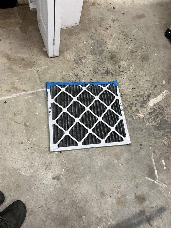 Responded to no cooling complaint with indoor temperature at 75 degrees. Upon inspection, found severely clogged air filter restricting airflow to the system, which was causing inadequate cooling performance. Replaced dirty filter with new unit and verified proper airflow restoration and system operation.