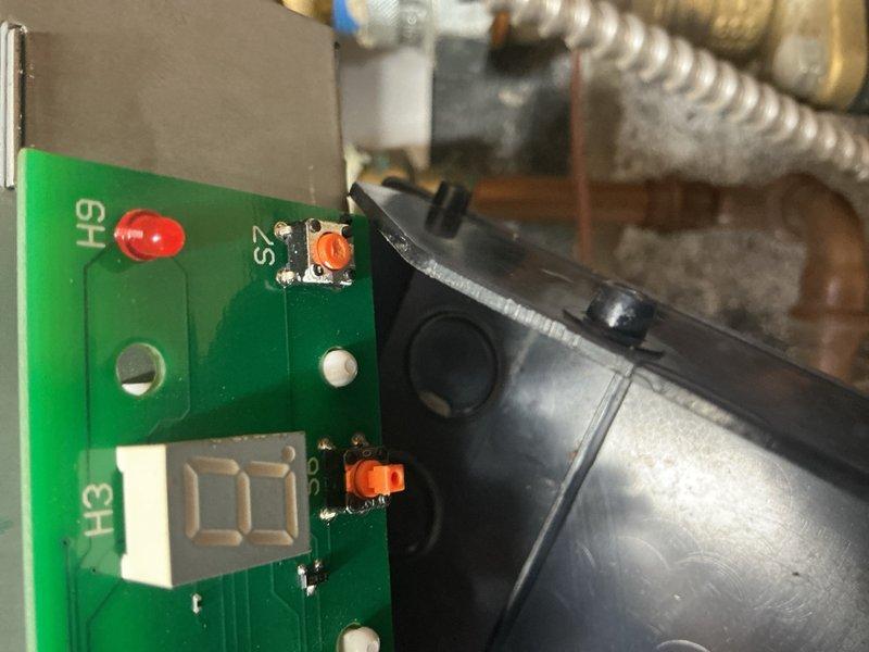 Responded to no hot water complaint on Triangle Tube propane combi boiler system displaying error code E18. Diagnosed faulty control board and replaced PCB component to restore proper operation. System tested and confirmed operational with appropriate pressure readings and hot water production restored.