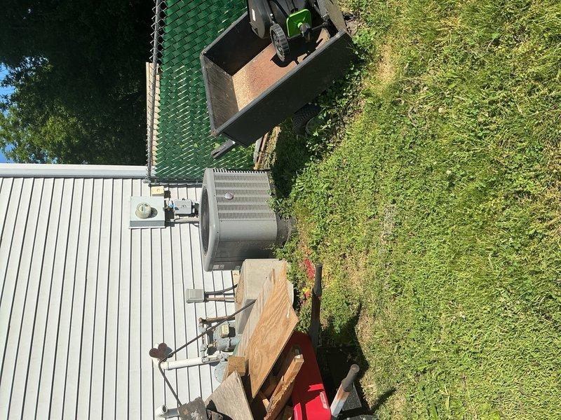 Performed comprehensive air conditioning tune-up and maintenance on Rheem system installed in October 2016. Completed inspection of outdoor condenser unit, cleaned outdoor coil, and verified proper system operation. Also conducted gas furnace tune-up on matching Rheem equipment from same installation date, with last service performed in September 2021. Noted previous observation of potential water heater leak that requires further investigation when area around unit is accessible for proper assessment.