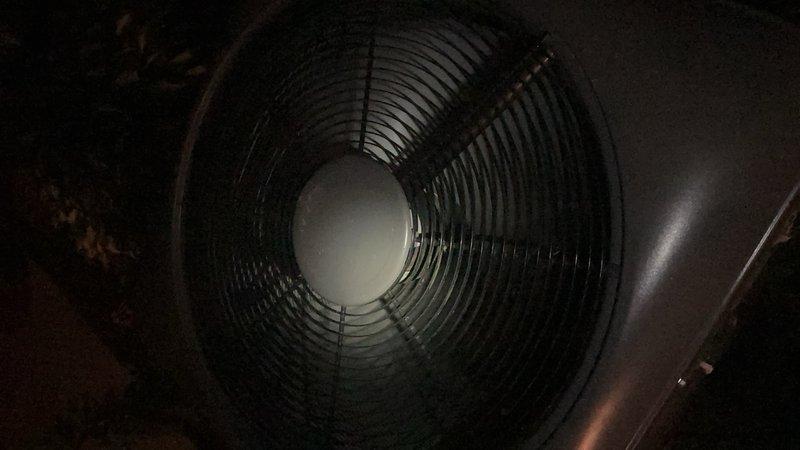 Performed routine maintenance inspection on heat pump system. Accessed internal components and verified proper electrical connections including capacitor, contactors, and control wiring. Inspected condenser fan assembly and confirmed operational status of fan motor and protective guard. All components found in working order with no immediate service needs identified.
