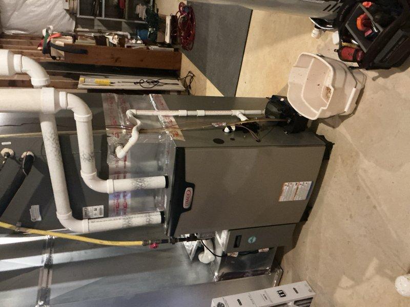 # After Hours Emergency HVAC Service

Responded to emergency call for non-functioning heating system. Upon arrival, discovered evaporator coil completely frozen with heavy ice accumulation on fins and refrigerant lines. System was shut down immediately to prevent compressor damage. Investigation revealed restricted airflow as primary cause of freeze-up condition.

Allowed coil to thaw completely while inspecting entire system. Checked air filter and found severely clogged, restricting airflow to approximately 30% of required capacity. Replaced dirty filter with new high-efficiency filter. Inspected blower motor operation and verified proper function once ice melted.

Used digital multimeter to test electrical components including capacitors, contactors, and safety switches. All electrical readings within manufacturer specifications. Verified proper refrigerant pressures once system thawed and confirmed no refrigerant leaks present.

Checked condensate drainage system for blockages. Cle