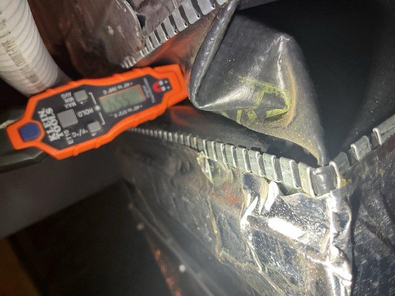 # After Hours Emergency HVAC Service

Responded to emergency call for non-functioning heating system. Upon arrival, discovered evaporator coil completely frozen with heavy ice accumulation on fins and refrigerant lines. System was shut down immediately to prevent compressor damage. Investigation revealed restricted airflow as primary cause of freeze-up condition.

Allowed coil to thaw completely while inspecting entire system. Checked air filter and found severely clogged, restricting airflow to approximately 30% of required capacity. Replaced dirty filter with new high-efficiency filter. Inspected blower motor operation and verified proper function once ice melted.

Used digital multimeter to test electrical components including capacitors, contactors, and safety switches. All electrical readings within manufacturer specifications. Verified proper refrigerant pressures once system thawed and confirmed no refrigerant leaks present.

Checked condensate drainage system for blockages. Cle