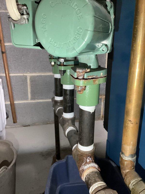 Responded to service call for leaking and hissing air relief valve on boiler system. Upon inspection, found Michigan automatic air vent installed in system experiencing intermittent leakage, likely due to recent plumbing modifications that added new piping to the boiler. Evaluated air elimination components and circulator pump connections for proper operation. System configured for summer/winter domestic hot water hookup operation.
