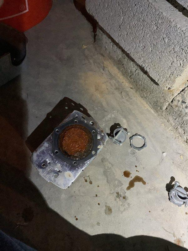 Responded to complaint of inconsistent water pressure with intermittent loss of water flow. Diagnosed failed pressure switch on well water pressure tank system. Removed and replaced defective pressure control switch and associated electrical connections. Disassembled corroded tank components showing signs of sediment buildup and internal corrosion. Reinstalled system with new hardware and clamps, verified proper electrical connections, and tested pressure cycling to confirm consistent water pressure restoration throughout property.