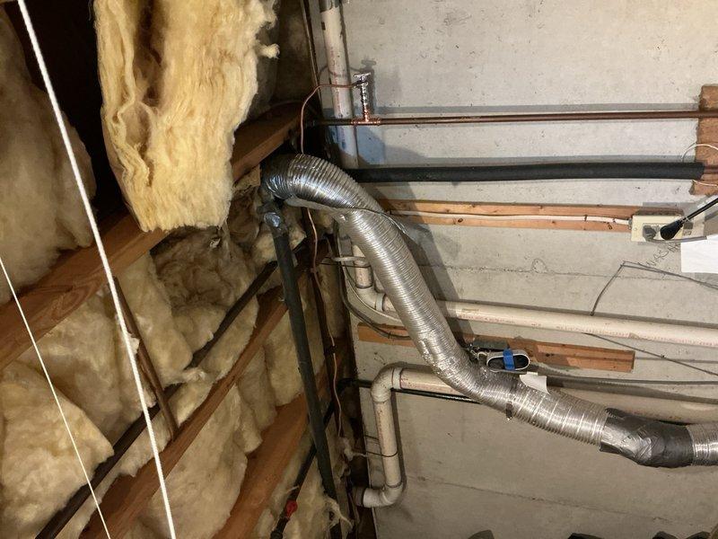 Responded to water leak at refrigerator ice maker supply line. Removed failed piercing valve and deteriorated 1/4" water line. Installed new 1/4 turn stop valve with fresh 1/4" supply line to refrigerator. Tested ice maker operation and verified all connections were leak-free upon completion.
