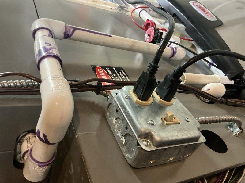 Completed comprehensive preventive maintenance inspection on Lennox heat pump system installed in March 2018. Performed standard CPM cooling season tune-up including visual inspection of electrical connections at junction box, condensate drain system with PVC piping, and condensate pump assembly. Verified proper operation of control boards, inductors, and wiring harnesses within the air handler compartment. All electrical connections secure, drain lines clear and functioning properly, and system components operating within normal parameters.