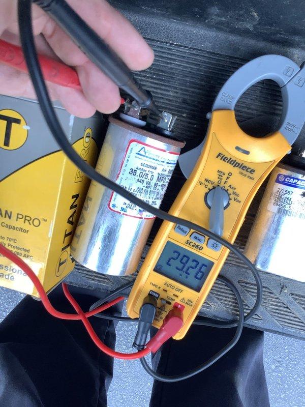 Completed multi-point repair on residential HVAC system requiring two-person crew. Re-leveled downstairs indoor air handler unit, performed blower wheel cleaning to restore proper airflow, replaced two failed capacitors (verified with diagnostic testing equipment), and installed new condensate float switch to prevent overflow issues.