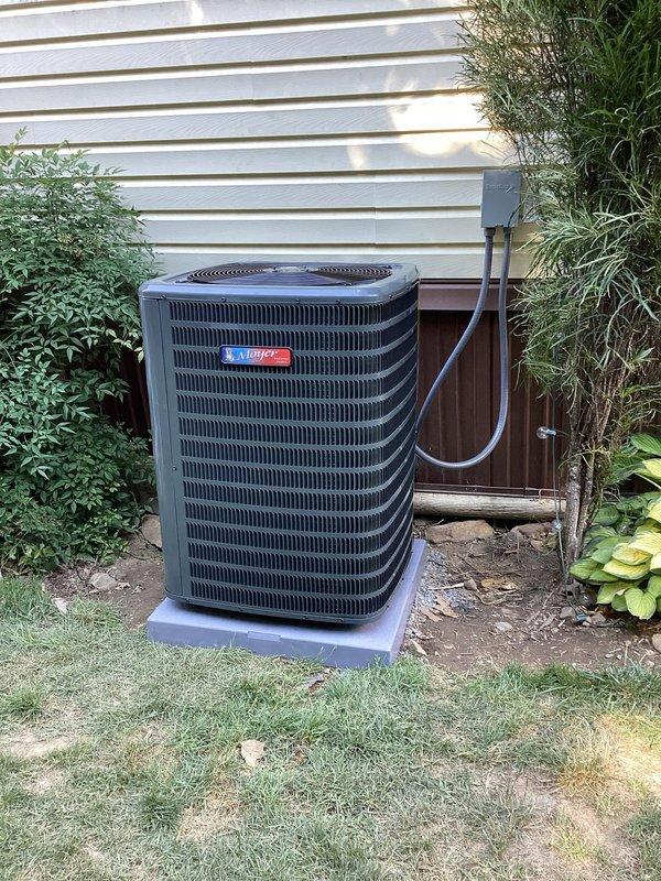 Completed full HVAC system changeout including installation of Thermo Pride oil furnace with Beckett burner assembly and Moyer Comfort Series air conditioning condenser unit mounted on concrete pad with 40-foot refrigerant line set. Accessed crawlspace beneath mobile home to replace 10-12 foot section of collapsed 10-inch flex ductwork, connecting new duct run between existing metal 90-degree elbow and intact ductwork penetrating floor membrane using appropriate couplings. Verified airflow to all bedroom supplies and confirmed proper system operation upon completion.