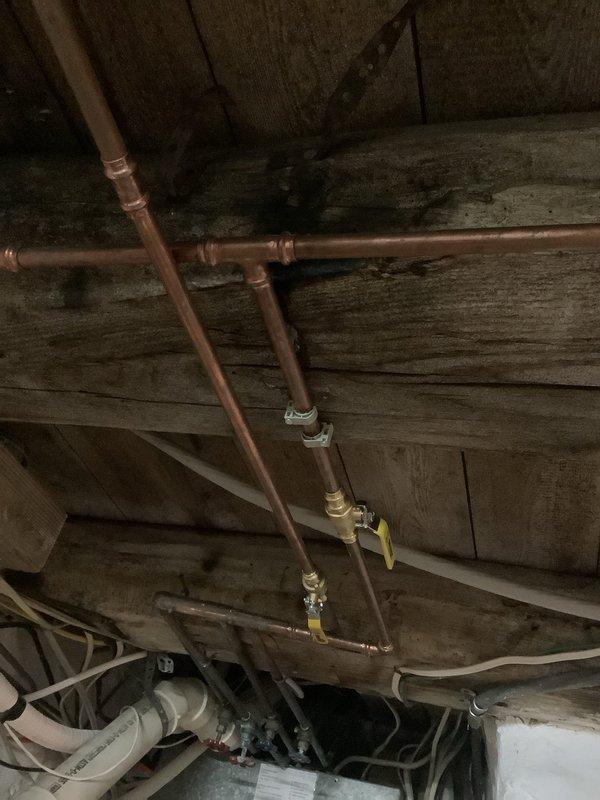 Replaced two shut-off valves feeding the bathroom to eliminate active leaking before customer's vacation. Installed new quarter-turn ball valves on copper supply lines to ensure reliable water control and prevent potential water damage during extended absence.