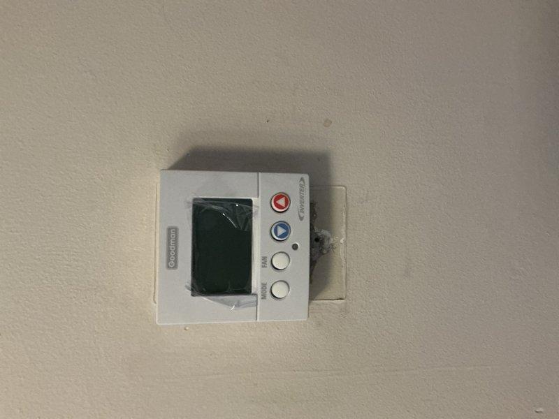 Responded to no cooling call on Amana system reported to be in lockout mode. Upon arrival, inspected thermostat and verified wiring connections at terminal blocks, documenting proper wire placement including R, C, Y, and W terminals. Performed diagnostic evaluation of system lockout condition and thermostat communication issues to determine root cause of cooling failure.