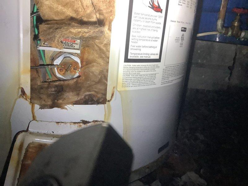 Responded to no hot water call and discovered a failed Bradford White 38-gallon electric water heater with active leaking from the bottom right panel. Upon inspection, determined the unit was not repairable due to tank failure and proceeded with complete replacement of the existing water heater with a new 40-gallon electric unit, restoring full hot water service to the residence.