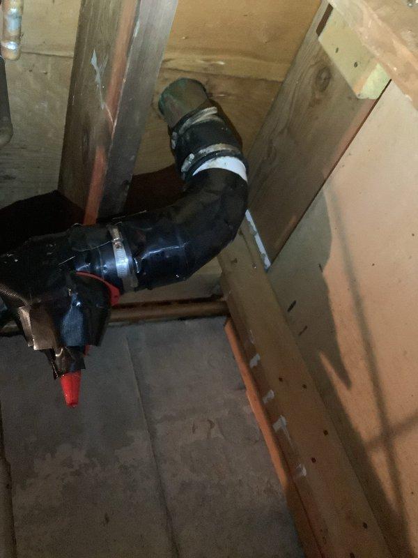 Responded to water leak in basement with standing water on concrete floor. Upon inspection, identified source of water intrusion and assessed damage to surrounding area including wooden floor joists and subflooring. Documented conditions showing significant water accumulation and moisture exposure to structural elements and foundation walls.