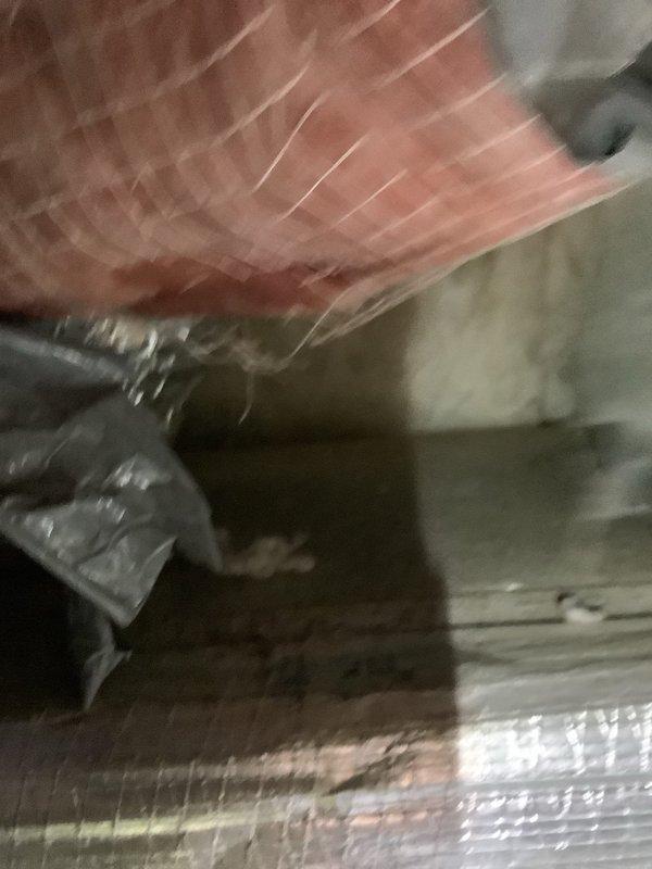 Responded to condensate leak from attic air handler causing ceiling water damage. Inspected drainage system and confirmed air handler was producing proper cooling after previous refrigerant charge. Identified condensate drain line issue causing overflow into living space. Cleared blockage from condensate drain line and verified proper drainage flow from air handler drain pan. System tested and confirmed operational with no further leakage detected.