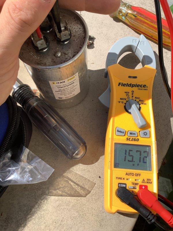 Responded to no cooling complaint where indoor unit was blowing warm air and outdoor unit failed to operate. Upon inspection, diagnosed failed run capacitor on condensing unit. Tested capacitor with digital multimeter, confirming it was out of specification and unable to start compressor. Replaced defective capacitor with new unit, verified proper microfarad rating and voltage specifications. Tested system operation, confirmed outdoor unit startup, and verified normal cooling cycle restored.