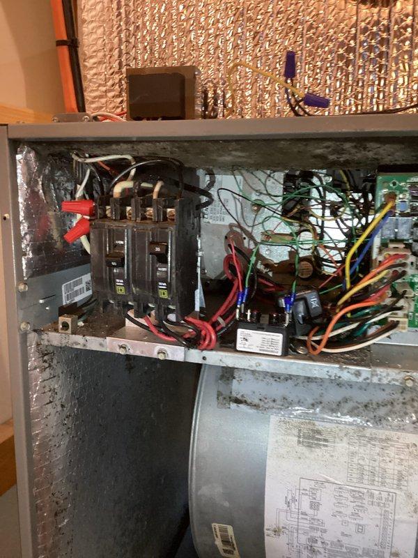 Completed installation of LED REME HALO indoor air quality system on existing HVAC air handler. Integrated unit with electrical panel, established proper wiring connections, and verified system operation to ensure active air purification throughout the conditioned space.