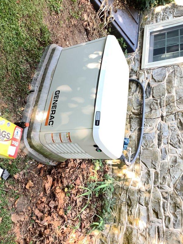 Completed scheduled maintenance service on a 24kW Generac whole home generator that was displaying an orange service indicator light. Performed comprehensive tune-up including replacement of both air filters, which showed significant dirt and debris accumulation from approximately four years of operation. Unit was found in operational condition prior to service and all maintenance procedures were completed according to manufacturer specifications.