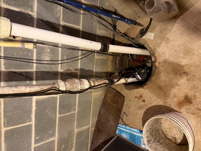 Responded to service call for malfunctioning sump pump that was humming continuously without pumping water. Upon inspection, confirmed pump motor was running but impeller was not moving water from the sump pit. Replaced defective primary sump pump unit under warranty with new pump from warehouse inventory. Tested system operation to verify proper water discharge and automatic float switch cycling. Confirmed backup pump remained operational and available for redundancy.