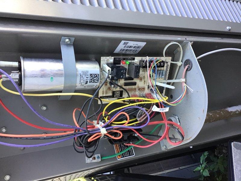 Completed comprehensive preventive maintenance inspection on residential air conditioning system installed in December 2019. Performed thorough examination of indoor air handler components including blower motor assembly, electrical connections, control board, and wiring harnesses. Verified all wire connections were properly secured with zip ties and showed no signs of overheating or deterioration. Inspected cylindrical blower motor and mounting brackets for proper operation and structural integrity. Examined control board for any signs of component failure, loose connections, or burnt circuits - all found to be in good working condition. Checked air filter condition and airflow. Inspected outdoor condensing unit including refrigerant lines, shut-off valves, and plumbing connections. Verified red shut-off valve operation and checked all copper and PVC piping for leaks or damage. All mechanical and electrical components functioning within normal parameters. System operational.
