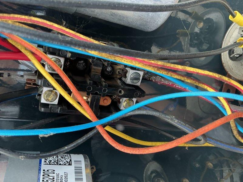 Responded to no-cooling call at bar/restaurant facility where HVAC system had ceased operation that morning. Upon inspection, accessed air handler unit mounted in utility space and performed diagnostic evaluation of electrical and mechanical components. Inspected internal wiring connections, circuit boards, capacitor, blower motor assembly, and associated control systems. Verified proper electrical connections at terminal blocks, checked capacitor specifications, and examined condensate drainage system including PVC piping and pump assembly. System was restored to operational status and tested for proper cooling function before departure.