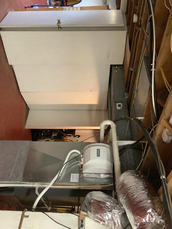 Installed new condensate pump and PEX drain line routing from the furnace/AC air handler to the existing sink drain. System tested and operational upon completion.