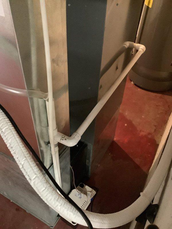 Installed new condensate pump and PEX drain line routing from the furnace/AC air handler to the existing sink drain. System tested and operational upon completion.