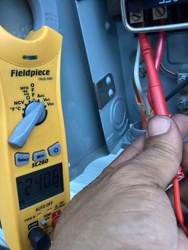 Completed comprehensive preventive maintenance inspection on residential air conditioning system. Accessed air handler unit in interior closet location, performed visual inspection of equipment condition and verified proper installation. Conducted electrical diagnostics using digital multimeter, confirming control voltage reading of 24VAC at system components. All equipment operating within normal parameters with no deficiencies noted during inspection.
