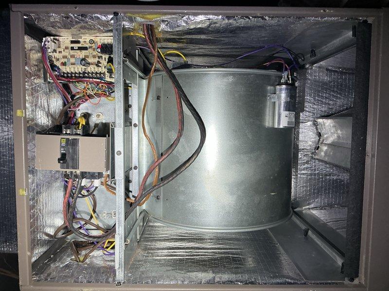 Performed comprehensive air conditioning tune-up on existing HVAC system. Replaced condensate drain line to prevent water damage and ensure proper drainage. Inspected air handler interior components including blower assembly, capacitor, control board, and electrical connections; all components found to be in proper working condition with secure wiring.