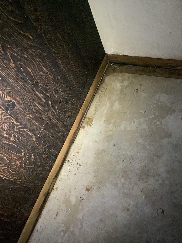 Responded to dispatch call and confirmed arrival window with customer. Upon inspection, discovered an additional leak beyond the original reported issue. Documented conditions with photographs showing water damage evidence at floor and wall junction areas. Customer to proceed with previously provided quote for water treatment work.