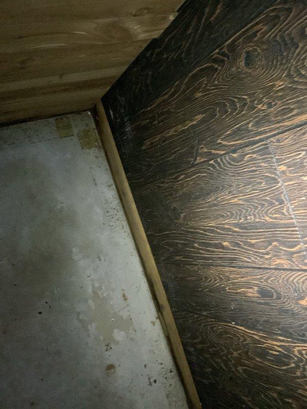 Responded to dispatch call and confirmed arrival window with customer. Upon inspection, discovered an additional leak beyond the original reported issue. Documented conditions with photographs showing water damage evidence at floor and wall junction areas. Customer to proceed with previously provided quote for water treatment work.