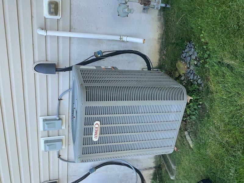Completed comprehensive air conditioning tune-up and maintenance on two Lennox systems serving first and second floors. Performed standard preventative maintenance procedures including inspection of electrical components, refrigerant levels, condensers, and system controls. Cleared blocked condensate drain line to restore proper drainage function. Customer expressed concerns regarding refrigerant levels; verified charge on both units and confirmed systems are operating within manufacturer specifications with no refrigerant loss detected at this time. Both emergency disconnect switches and outdoor condenser units inspected and found in proper working condition with no issues reported by customer.