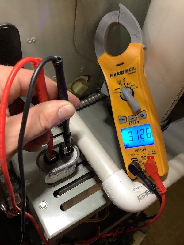 Completed comprehensive CPM air conditioning inspection on existing Trane system, performing standard tune-up procedures including system performance evaluation and electrical diagnostics. Utilized clamp meter to measure amperage draw on compressor and blower motor circuits, verifying proper electrical operation and component functionality. Tested capacitor with multimeter to assess microfarad ratings and voltage specifications, confirming electrical components are operating within manufacturer parameters at time of inspection.