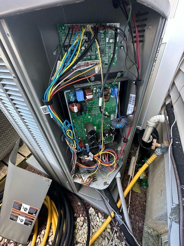 Responded to communication error between thermostat and hub displaying error code 31, causing unit shutdown after repeated reboots. Addressed condensate pump overflow issue with water spilling onto unit floor. Accessed control panel to inspect circuit boards, wiring connections, and communication components. Verified proper operation of condensate removal system and resolved communication fault between thermostat hub and HVAC control board to restore normal system operation.