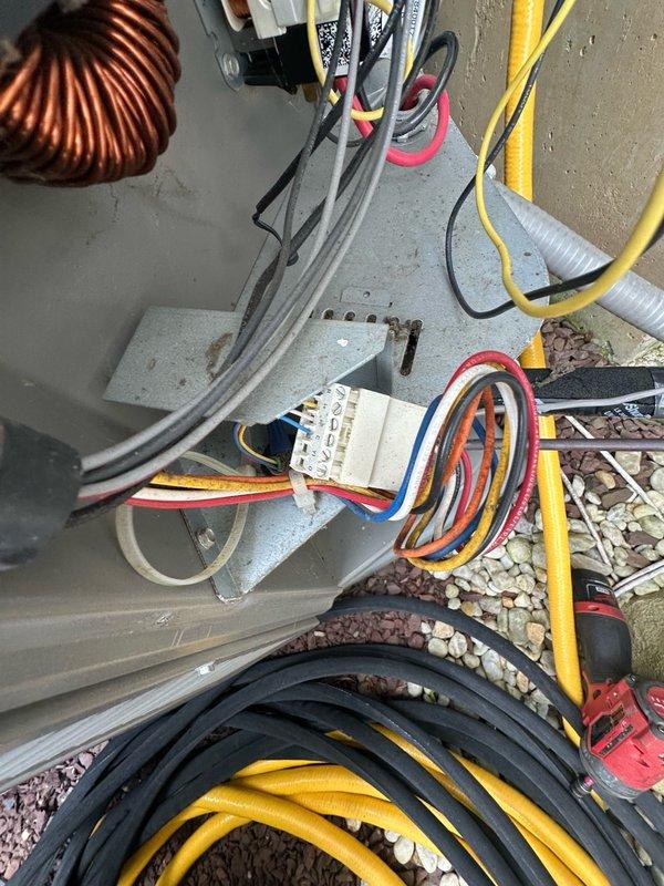 Responded to communication error between thermostat and hub displaying error code 31, causing unit shutdown after repeated reboots. Addressed condensate pump overflow issue with water spilling onto unit floor. Accessed control panel to inspect circuit boards, wiring connections, and communication components. Verified proper operation of condensate removal system and resolved communication fault between thermostat hub and HVAC control board to restore normal system operation.